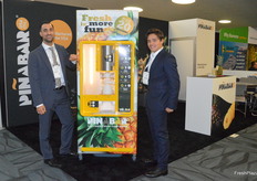 Michael van Keeken and Calo Cimo of Dutch Food Technology presenting their machine which makes slices or cubes from a pineapple in just some seconds. It fits in the convenience trend but also adds some extra experience.